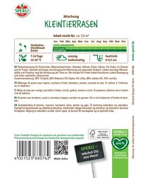 Dekorativer Aufkleber mit grünem Herz, Schriftzug "SPERLI wächst Dir ans Herz" auf einem kleinen Ständer.