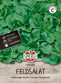 Bündel Feldsalat mit grünen Blättern, auf Holzuntergrund, Markenlogo und Etikett.